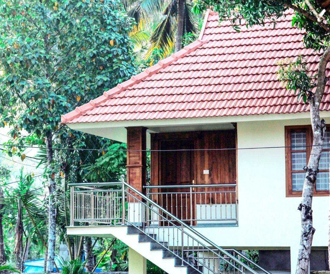 Alappuzha Aramana Holiday Inn חדר תמונה